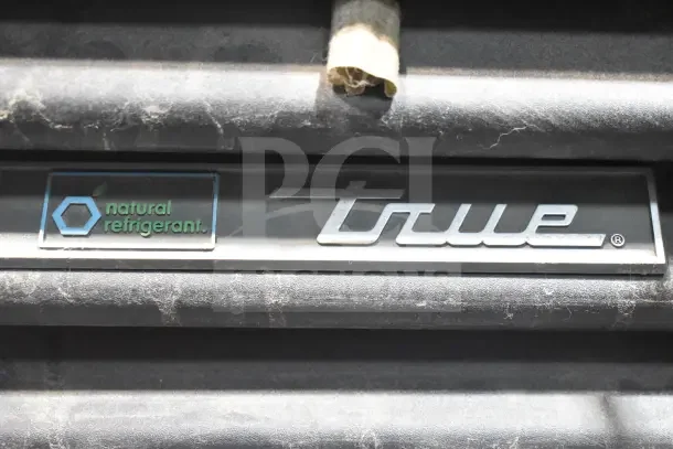 True GDM-72F-HC logo on a commercial freezer, indicating use of natural refrigerant.