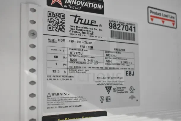2019 True GDM-49F-HC commercial freezer tag showing model, voltage, and refrigerant information. Tested and working.