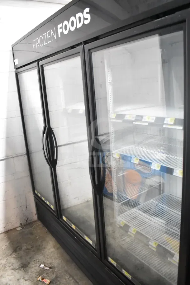 2018 True GDM-72F-HC Commercial 3 Door Reach-In Freezer Merchandiser, tested and working, with glass doors and shelving.