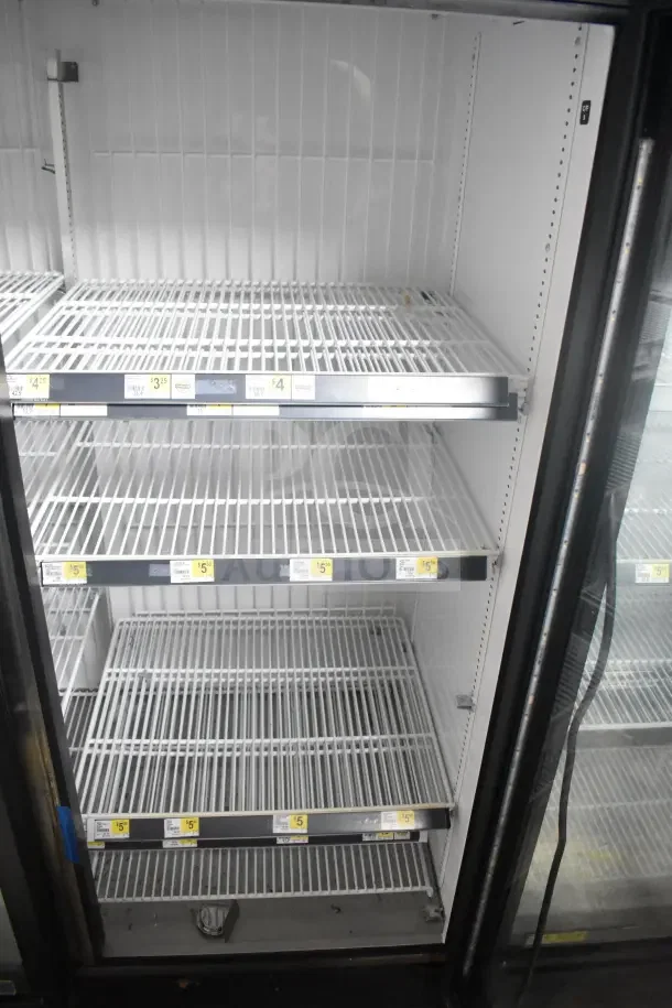 2018 True GDM-72F-HC commercial 3-door freezer merchandiser, clean interior, white wire shelving, tested and working.