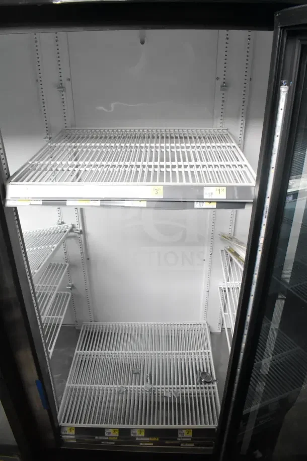 2018 True GDM-72-HC 3 Door Reach In Cooler, 115V, 1 Phase, shelves visible, tested and working condition.