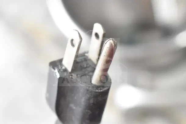 Plug of Anvil Commercial Countertop Planetary Dough Mixer, three-prong, 115 volts, 1 phase. Close-up view.
