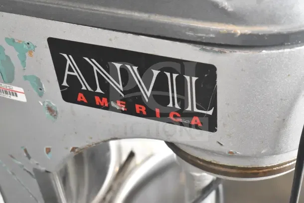 Anvil Commercial Countertop Planetary Dough Mixer with bowl and paddle. Visible wear on outer surface. 115V, 1 Phase.