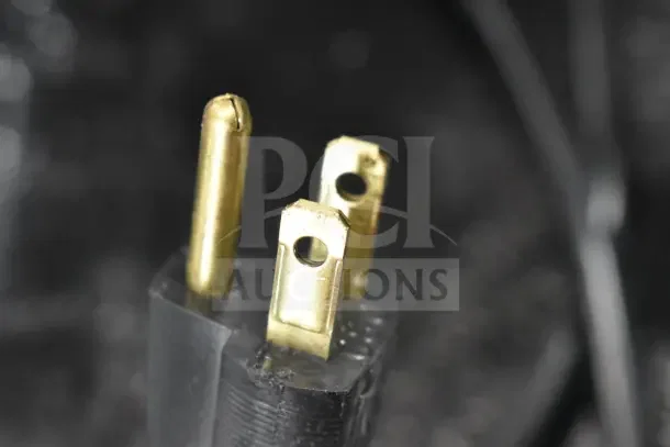 Close-up of a power plug, part of the 2020 Bunn 2SH STAND 27875.0201 Commercial Countertop Double Satellite Server Stand.