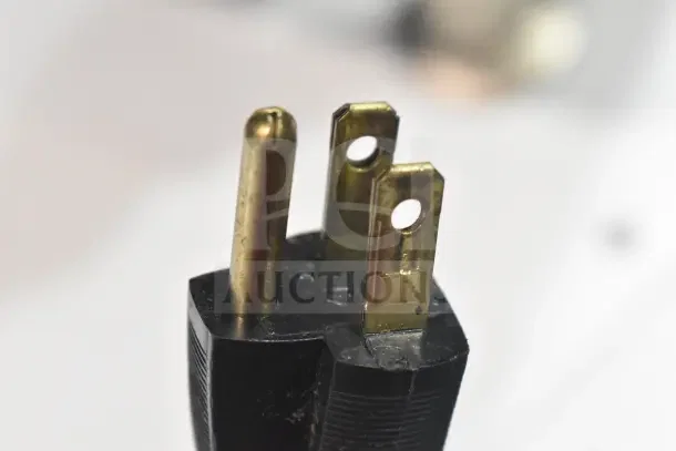 Close-up image of a three-prong plug end for a 2020 Bunn 2SH STAND Commercial Countertop Double Satellite Server Stand.