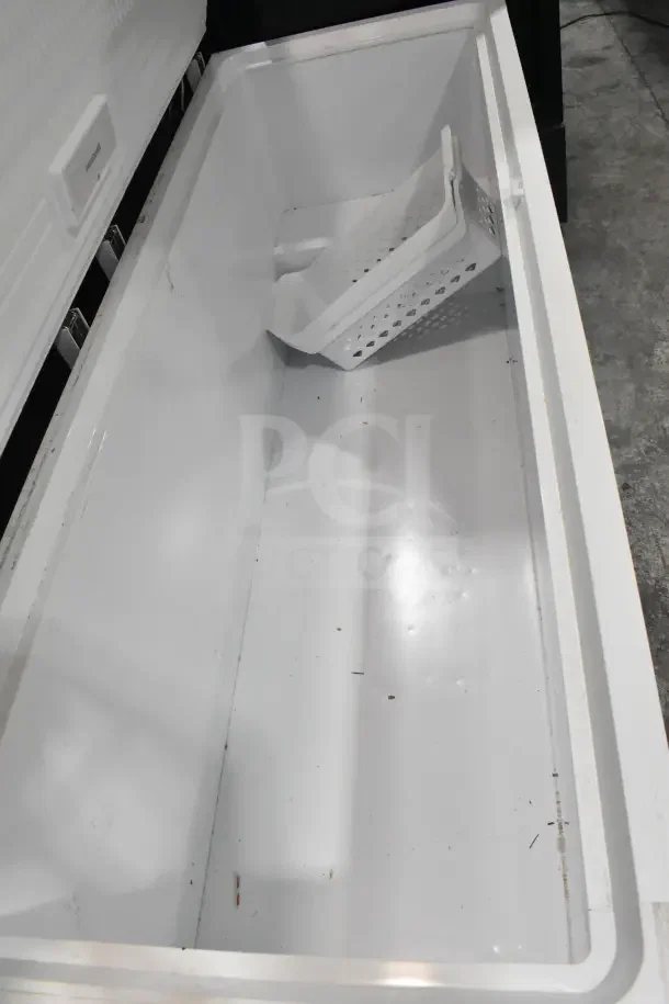 Frigidaire Commercial Chest Freezer, 115 Volts, 1 Phase, clean interior with removable basket, excellent condition.