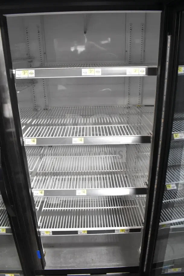 2018 True GDM-72-HC commercial cooler, 3 glass doors, adjustable shelves, 115 volts, 1 phase, used condition.