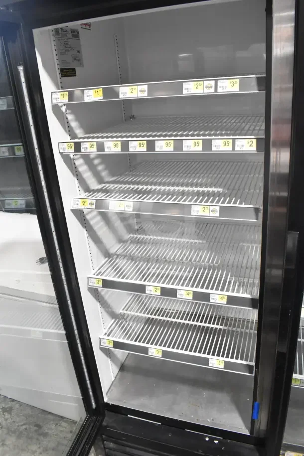 2018 True GDM-72-HC Commercial 3 Door Reach In Cooler, features wire shelving, good condition, 115V, 1 Phase.