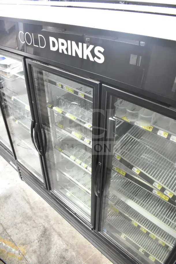 2018 True GDM-72-HC commercial cooler with 3 glass doors, labeled "Cold Drinks." 115V, 1 Phase, excellent condition.