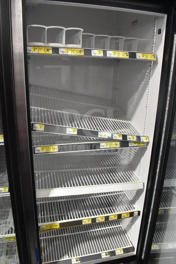 2018 True GDM-72-HC 3-door reach-in cooler, excellent condition. Features include adjustable shelves, 115 volts, 1 phase.