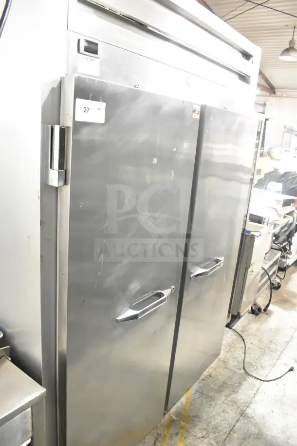 Randell 2020F Commercial 2-Door Reach-In Freezer, stainless steel, 115V, 1 phase, visible wear, model label present.