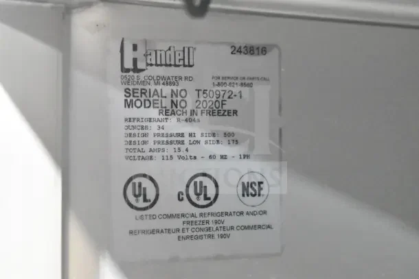 Randell 2020F Commercial 2 Door Reach In Freezer label showing model, voltage (115V), refrigerant type (R-404a), and safety certifications.