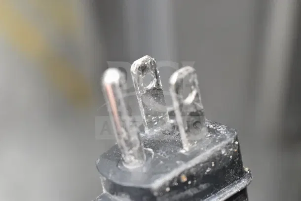 Power plug of Whynter Commercial Single Door Reach In Wine Cooler Merchandiser, 120 Volts, showing slight wear.