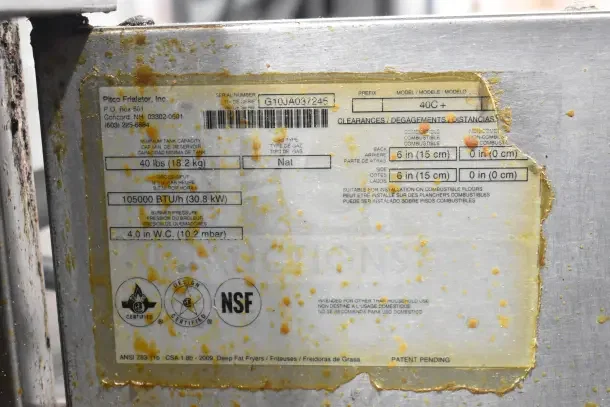 Pitco Frialator 40C commercial fryer label, 105,000 BTU, natural gas, NSF certified. Slight wear visible.