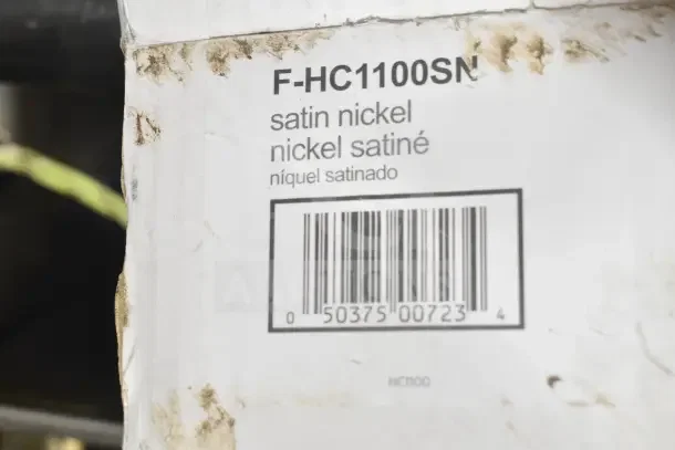 Insinkerator F-HC1100SN faucet in original box, satin nickel finish; barcode visible. Ideal for hot/cool water dispensing.