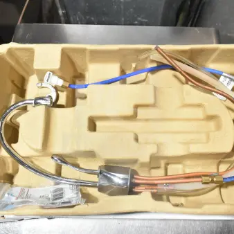 Insinkerator F-GN1100C Instant Hot Water Dispenser in original box, chrome finish, new condition, with installation components.