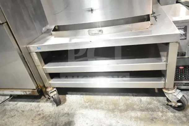 2017 Turbochef Encore 2 rapid cook oven on a stainless steel equipment stand, features 208/240V, 1-phase power.