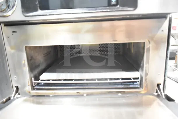 2017 Turbochef Encore 2 rapid cook oven, electric, countertop model on stand, 208/240V, visible wear inside, clean condition.