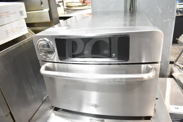 2017 Turbochef Encore 2 commercial countertop rapid cook oven, stainless steel, on equipment stand, electric, 208/240V.