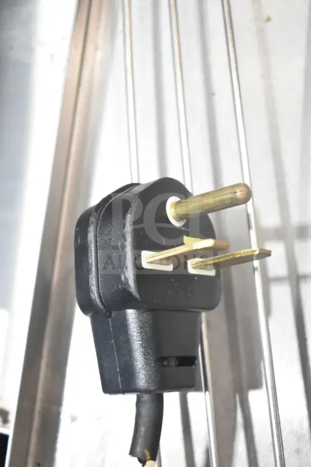 Close-up of a three-prong plug for Hatco ITQ-1750-2C commercial conveyor toaster, showing electrical compatibility.