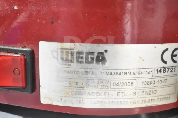 Wega commercial countertop espresso bean grinder base, 115 volts, 1 phase. Features visible label with model details. Used condition.
