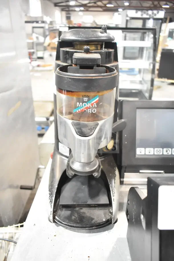 Wega commercial countertop espresso bean grinder base, 110 volts, Moka D'Oro label, used condition.