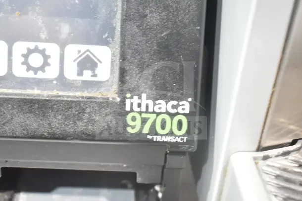 2 Transact Ithaca 9700 food prep labelers, black casing, visible brand logo, used condition, doubles your bid value.