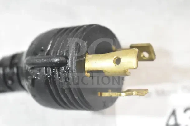 Black and gold power plug of Schaerer SCA1 Coffee Art Commercial Espresso Machine, 208-240 Volts, in good condition.