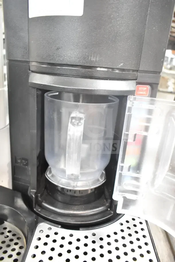 2023 Taylor SB24-12 commercial countertop frozen beverage machine, black, 115V, 1 phase, with clear mixing jug.