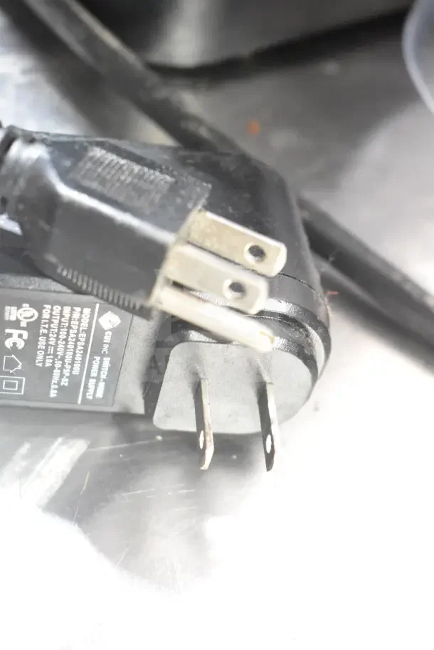 2023 Taylor SB24-12 frozen beverage drink machine power plug, 115 volts, 1 phase, shown on countertop.