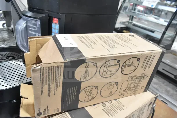 IN ORIGINAL BOX! Insinkerator HWT Instant Hot Water Tank, installation instructions visible, box slightly open.