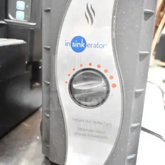 IN ORIGINAL BOX! Insinkerator HWT Instant Hot Water Tank; black/gray, visible control knob, branded logo, excellent condition.