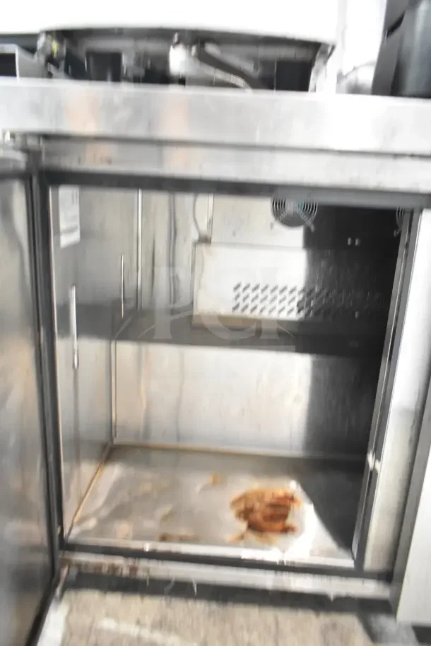 Atosa Commercial 2 Door Undercounter Cooler, 115 Volts, 1 Phase. Visible interior stains, suitable for restaurant use.