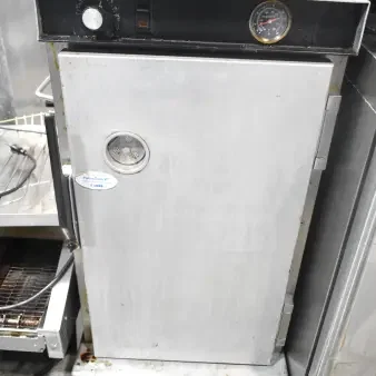 CresCor H33S128C heated holding cabinet on casters, 120V, 1-phase, with temperature dial and Patho-Guard label visible.