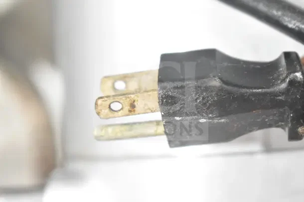 Detailed view of the plug on CresCor H33S128C Commercial Heated Holding Cabinet. 120 Volts, 1 Phase.