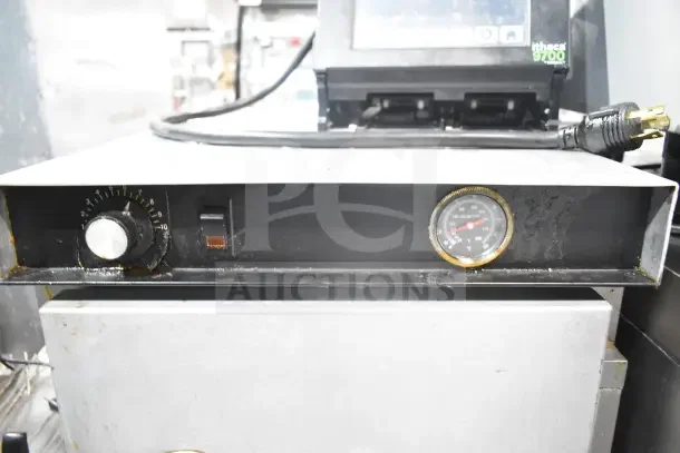 CresCor H33S128C Commercial Heated Holding Cabinet, temperature gauge, control knob, on commercial casters, 120V.