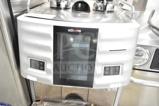Schaerer SCA1 Coffee Art espresso machine with 2 hoppers, touchscreen display, silver finish, 208-240V, 1 phase.