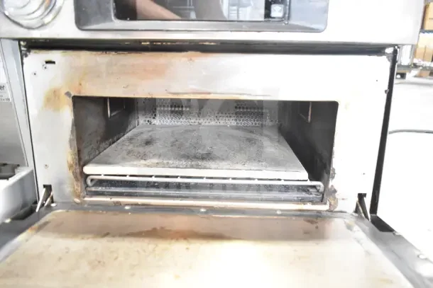 Turbochef Encore 2 commercial rapid cook oven, 208/240V, 1 phase. Used condition with visible wear inside.