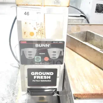 Bunn G9-2T DBC coffee grinder, missing lids, commercial countertop model, 120V, visible wear, model label shown.