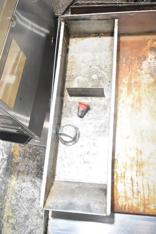 Star Commercial Countertop Flat Top Griddle showing thermostatic controls and cooking surface, with signs of surface wear.