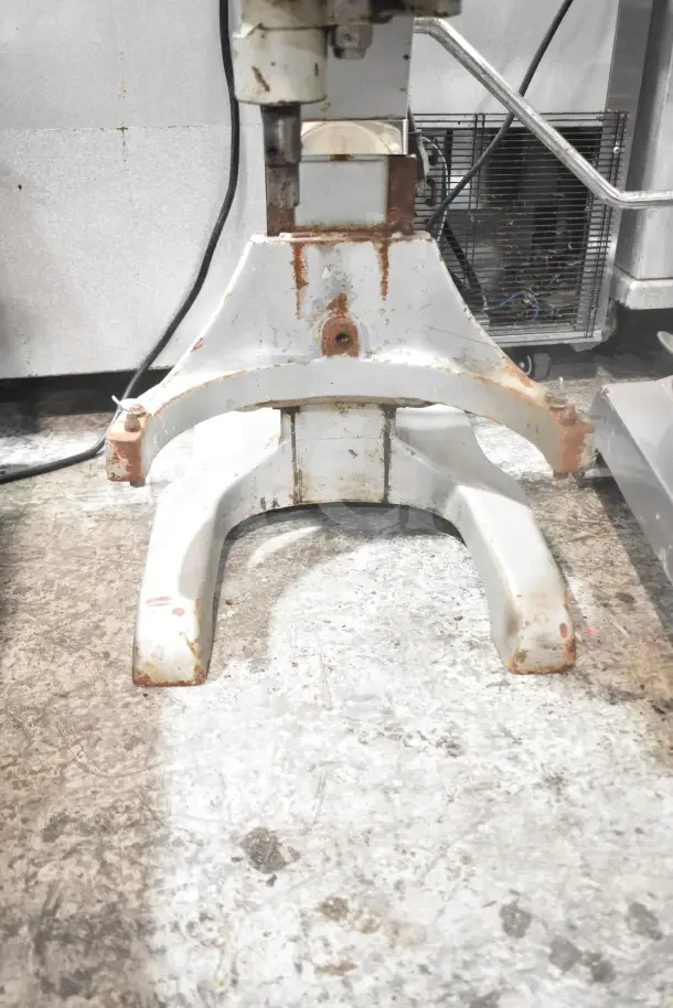 Thunderbird ARM-02 20 Quart Planetary Dough Mixer, commercial countertop model, showing visible wear and rust on base.