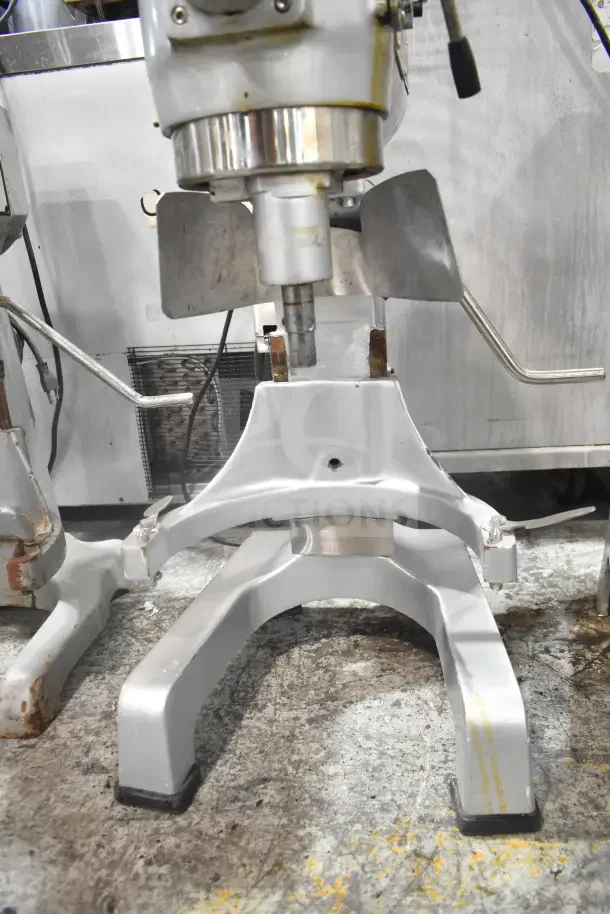 M20A Commercial Countertop 20L Planetary Dough Mixer with bowl guard. 110 volts, 1 phase. Good condition, visible wear.