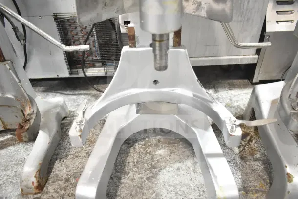 M20A commercial countertop 20L planetary dough mixer, visible bowl guard, 110V, 1 phase, shows signs of use and wear.