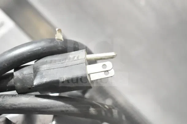 Power cord of M20A Commercial Countertop 20L Planetary Dough Mixer, 110V, showing plug close-up.