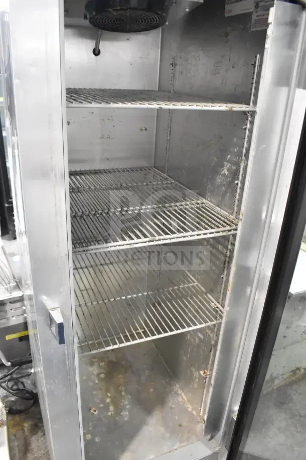 2019 Continental 1RNGD cooler, single door, wire shelves, visible wear, 115 volts, 1 phase. Ideal for commercial use.