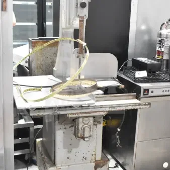 Butcher Boy B14 Commercial Meat Saw, floor style, 220V, 1 phase, shows signs of wear, visible blade, and worktable.