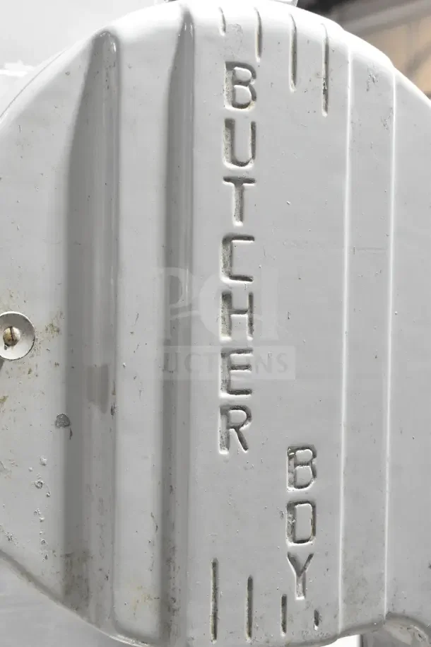 Butcher Boy B14 commercial meat saw, 220 volts, 1 phase, floor style, embossed brand name on side.