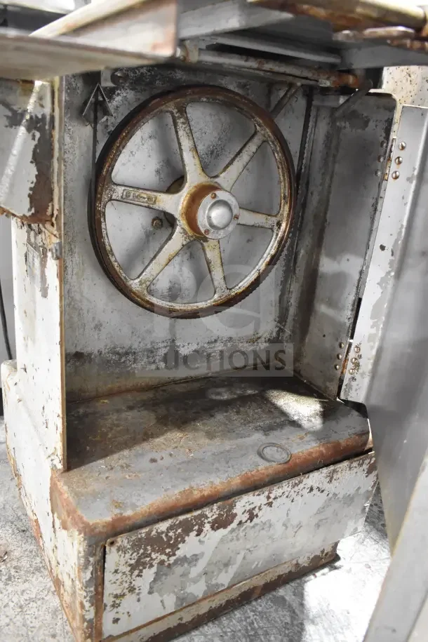Butcher Boy B14 Commercial Meat Saw with visible rust, 220 Volts, 1 Phase. Floor style model, used condition.