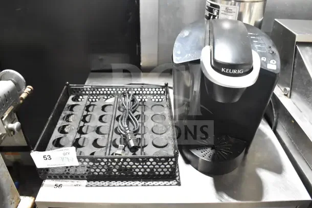 Keurig K40 single cup coffee machine with pod holder, black, includes power cord, used condition, countertop model.