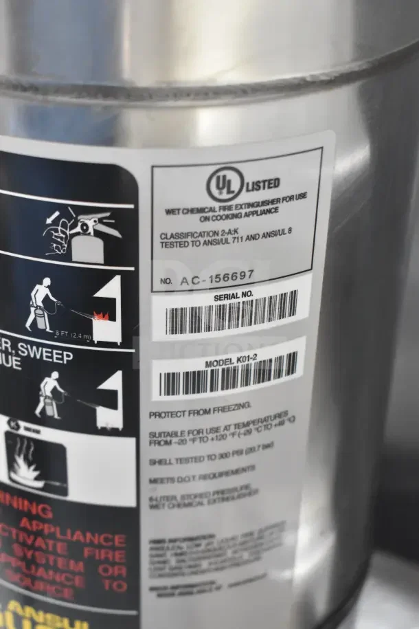 K Guard Wet Chemical Fire Extinguisher, Model K01-2, UL Listed for cooking appliances, Classification 2-A:K, tested to ANSI/UL 711 and ANSI/UL 8. Serial No. AC-156697.